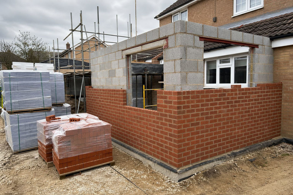 Bricks and concrete blocks used to build a house extension